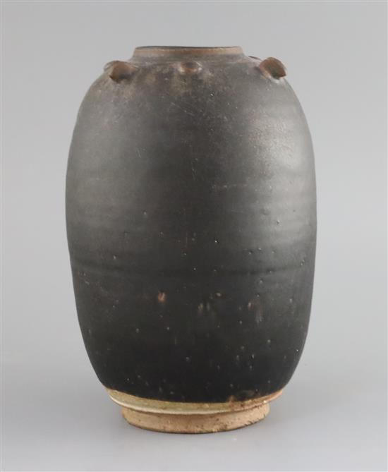 A Chinese Henan dark brown glazed jar, Song-Yuan dynasty, H. 23cm